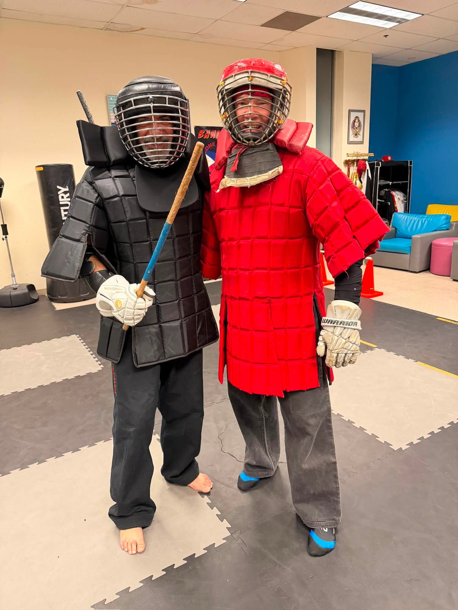 Two East Valley TEK adult students in padded sparring armor