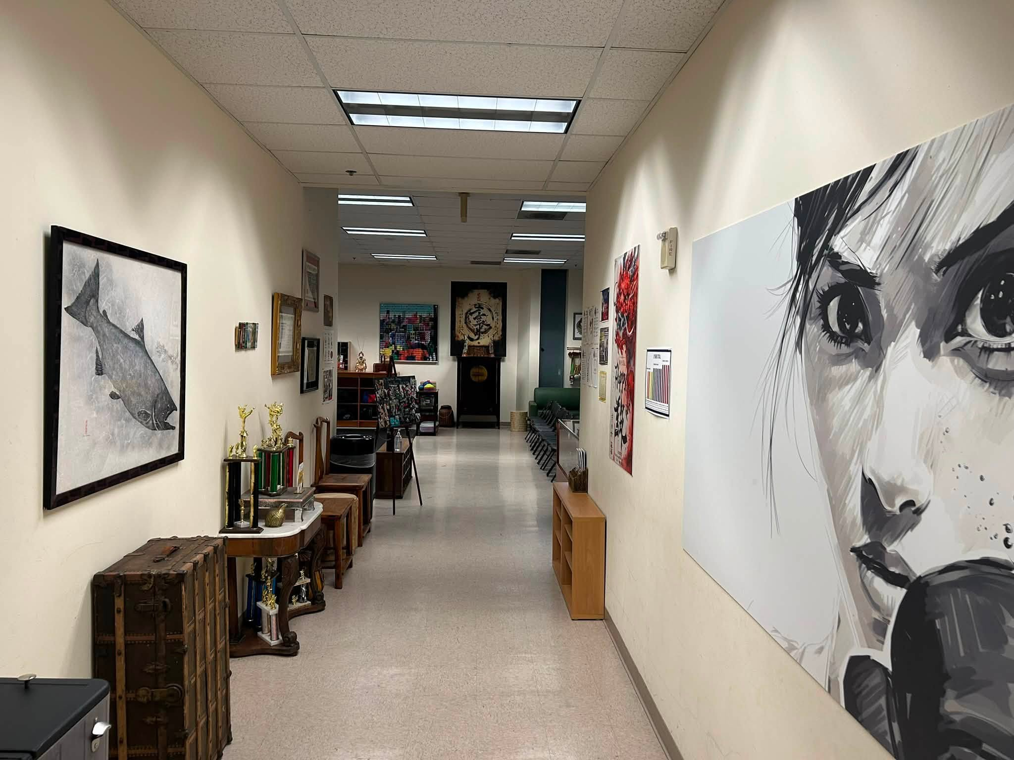 East Valley TEK hallway with Martial Arts artwork and trophies