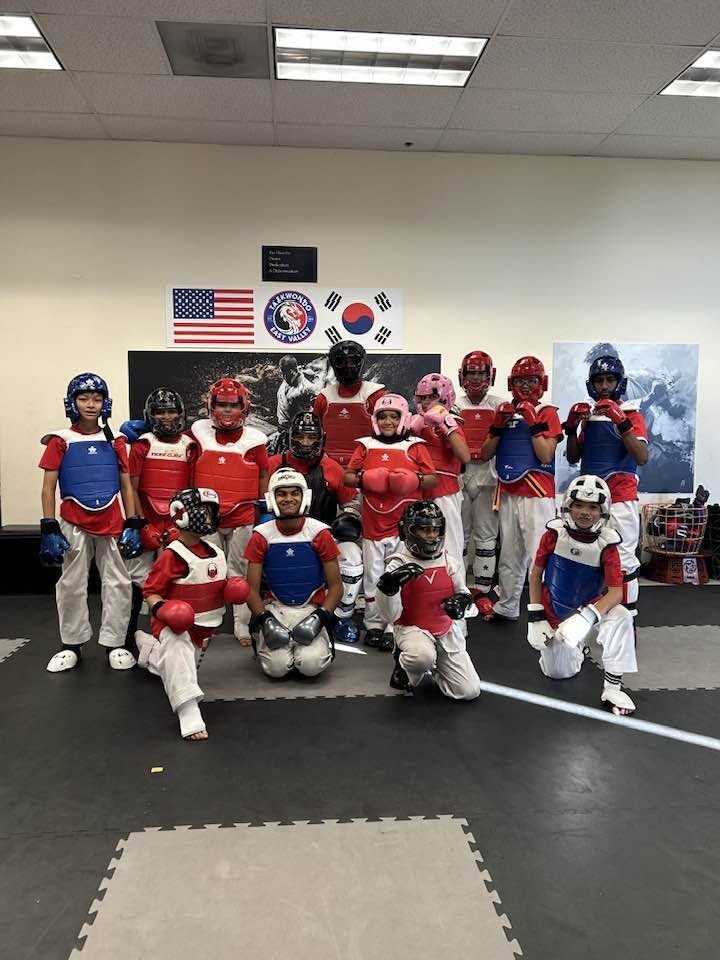 East Valley TEK youth sparring team in protective equipment
